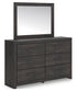 Hollivern Queen Panel Bed, Dresser, Mirror, Chest and Nightstand