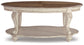 Realyn Oval Cocktail Table