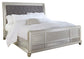 Coralayne King Upholstered Sleigh Bed with Mirrored Dresser