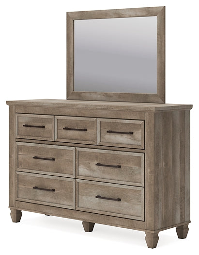 Yarbeck Queen Panel Bed with Mirrored Dresser and Chest